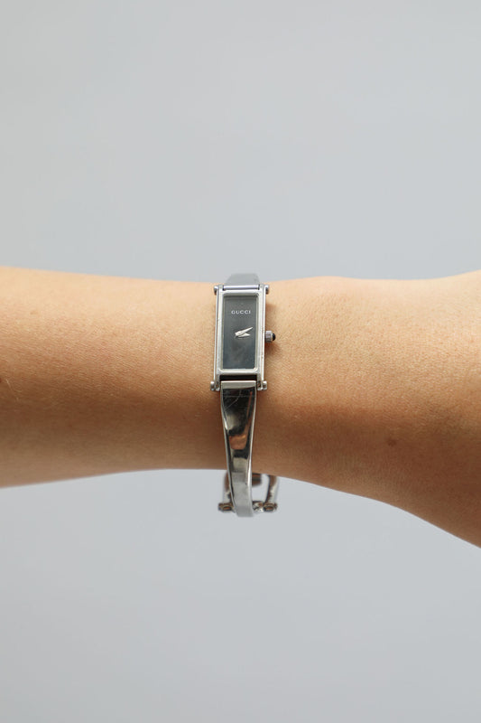 Gucci 1500L Bangle Watch - Silver Band & Black Dial