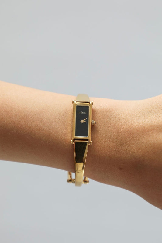 Gucci 1500L Bangle Watch - Gold Band & Black Dial